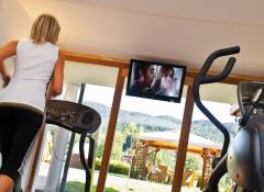 Fitnessraum mit Fernseher