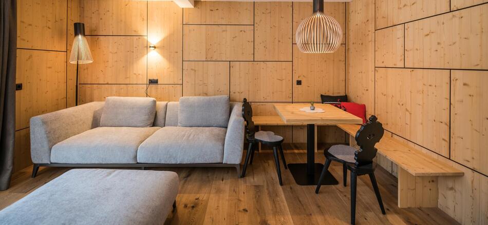 Sofa und Wohnbereich „Penthouse Suite Caminetto“