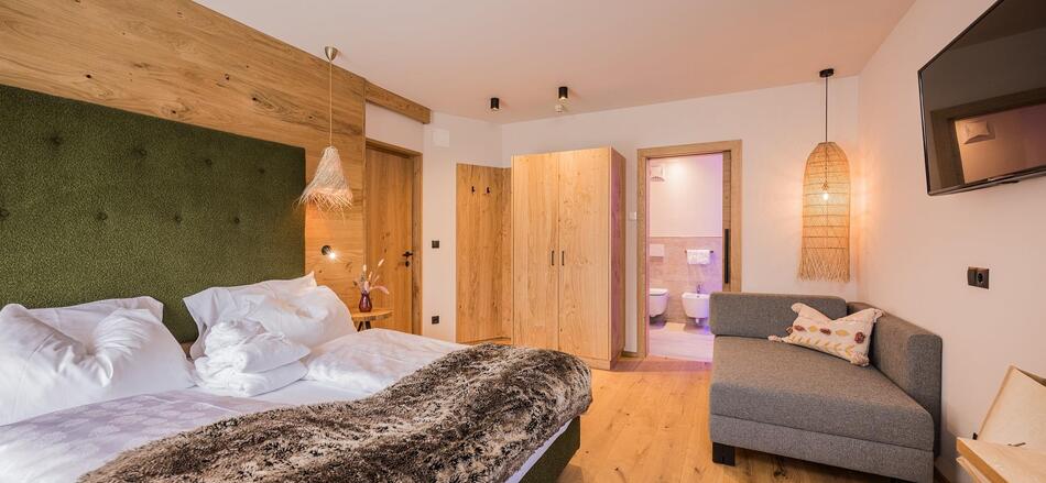 Dependance nature with bed, sofa, wardrobe, TV and bathroom